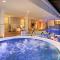 Uno degli idromassaggi del Carlo Magno Hotel SPA & Resort di Madonna di Campigli